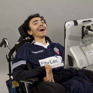 laughing boy using eyegaze device